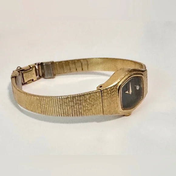 Vintage Seiko Women 2B20-5059 Diamond Accent Gold Tone Quartz 17mm Watch 6 1/4